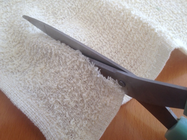 Cut out a strip from a face cloth.